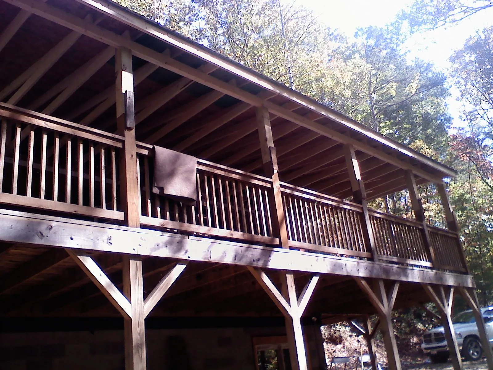 Timber framing under a new elevated porch and deck — Roof Leak Repair in Veteran by Roofing Brothers